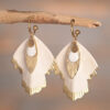 Vespera – Boucles dorées ailes blanches